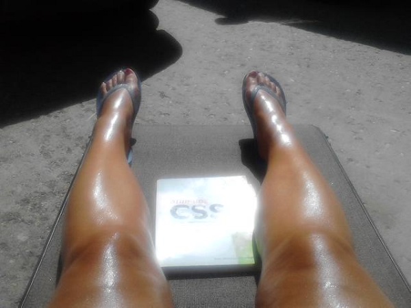tan legs and a good book
